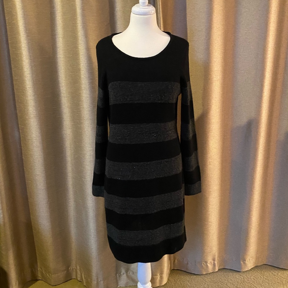 Knee length sweater dress.